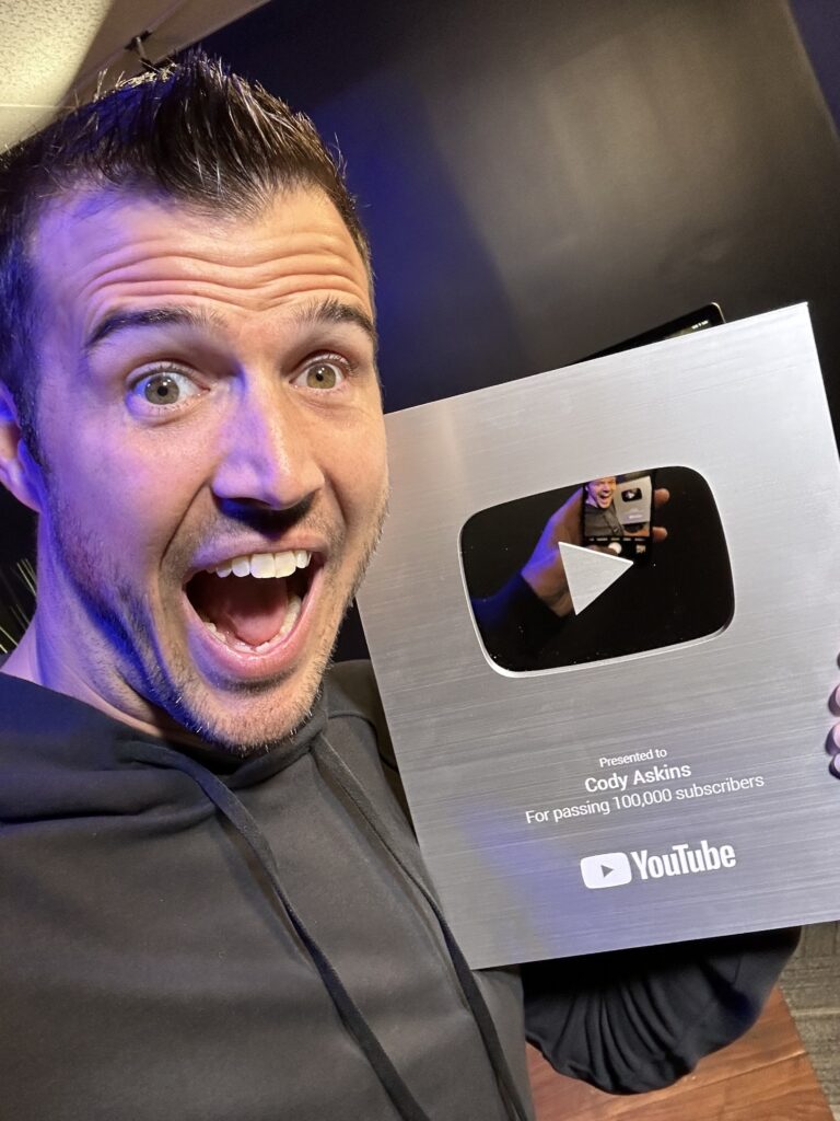 Cody Askins celebrating YouTube Silver Play Button milestone
